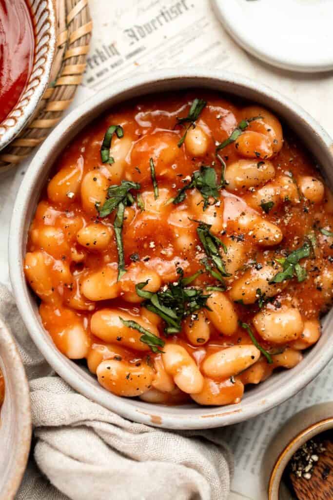 Homemade Baked Beans are the perfect side dish with their sweet and savory flavor, tender beans, and glossy sauce. So much better than canned baked beans! | aheadofthyme.com
