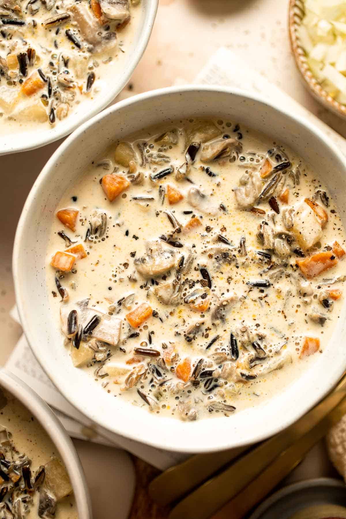 This homemade Creamy Wild Rice Soup is a simple recipe made with mushrooms, nutty wild rice, and yellow potatoes to offer a variety of textures and flavors. | aheadofthyme.com