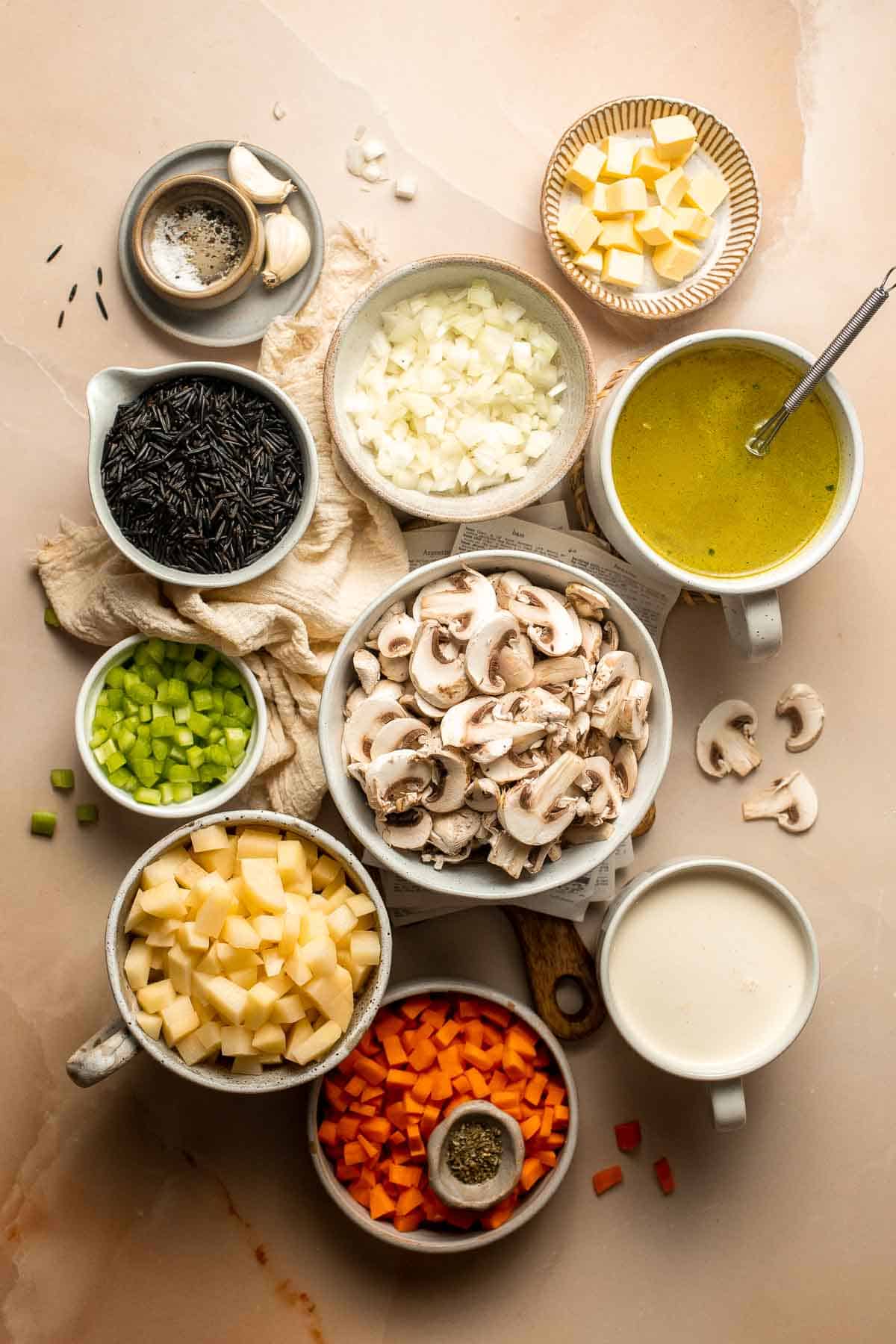 This homemade Creamy Wild Rice Soup is a simple recipe made with mushrooms, nutty wild rice, and yellow potatoes to offer a variety of textures and flavors. | aheadofthyme.com