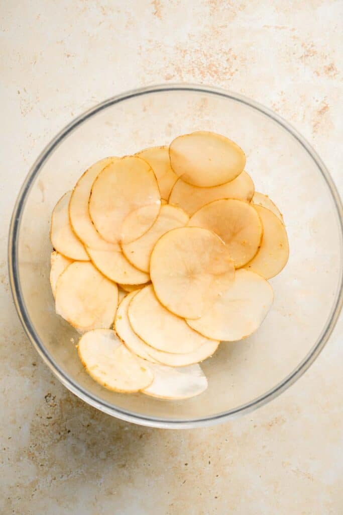 With a perfectly crisp crunch and a slightly salty flavor, these Homemade Baked Potato Chips are so much better than the prepackaged chips at the store. | aheadofthyme.com