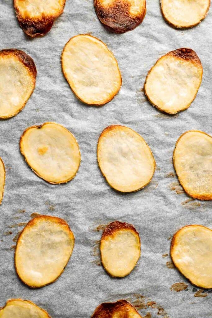 With a perfectly crisp crunch and a slightly salty flavor, these Homemade Baked Potato Chips are so much better than the prepackaged chips at the store. | aheadofthyme.com