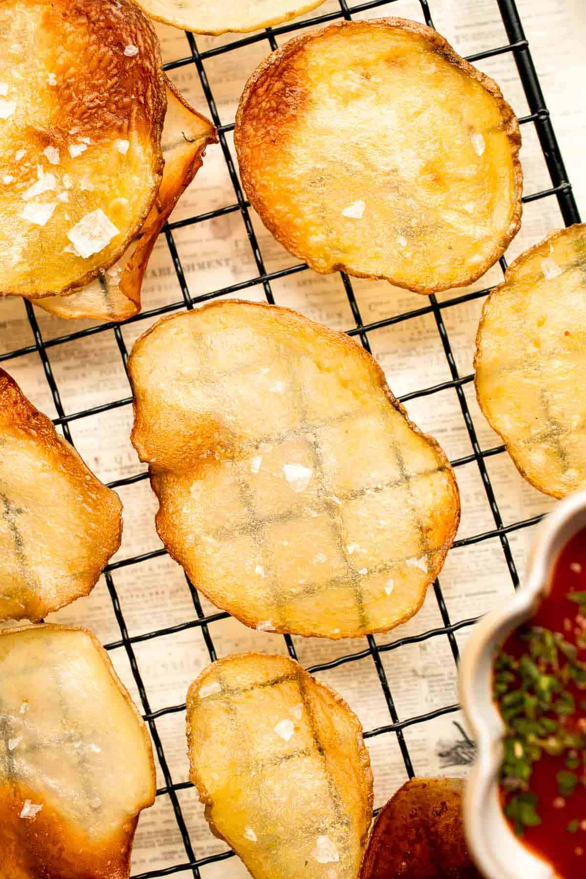 With a perfectly crisp crunch and a slightly salty flavor, these Homemade Baked Potato Chips are so much better than the prepackaged chips at the store. | aheadofthyme.com