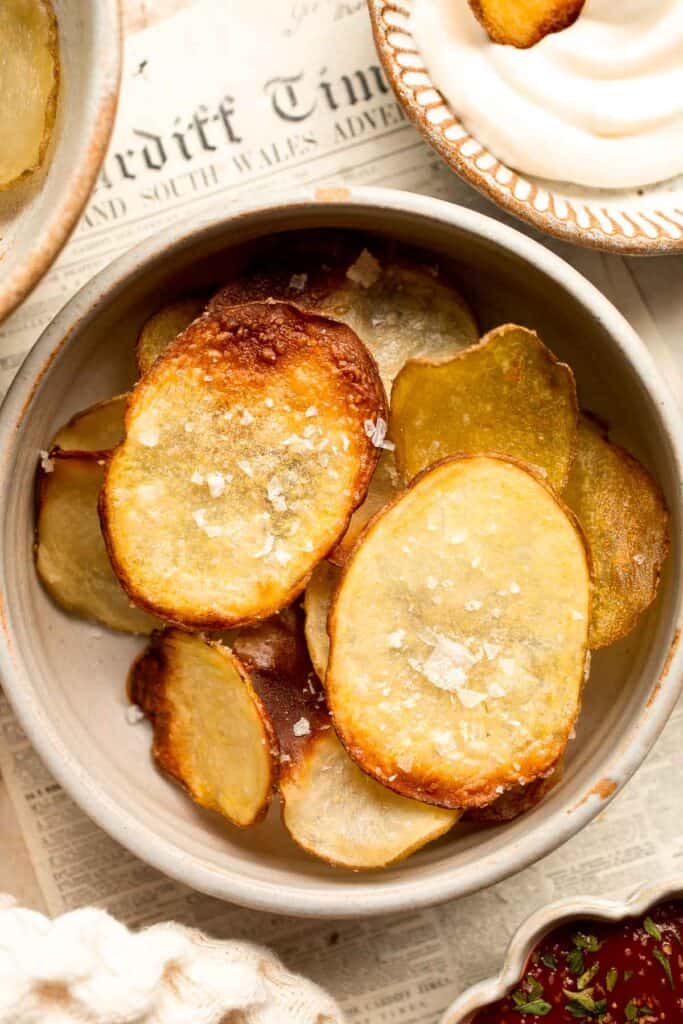 With a perfectly crisp crunch and a slightly salty flavor, these Homemade Baked Potato Chips are so much better than the prepackaged chips at the store. | aheadofthyme.com