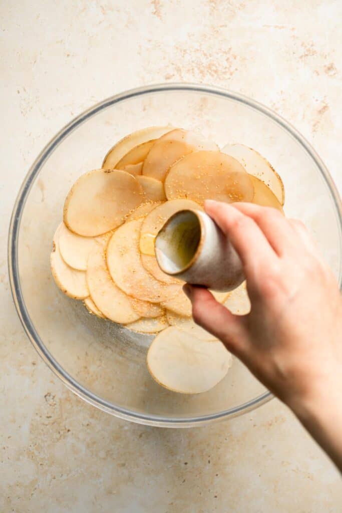 With a perfectly crisp crunch and a slightly salty flavor, these Homemade Baked Potato Chips are so much better than the prepackaged chips at the store. | aheadofthyme.com