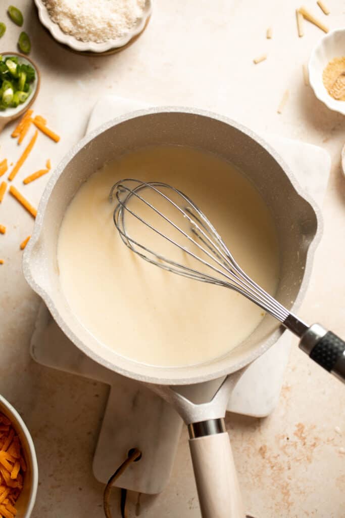 This decadent Mac and Cheese Soup is everything you love about macaroni and cheese turned into a rich and creamy soup. Ready in just 30 minutes! | aheadofthyme.com