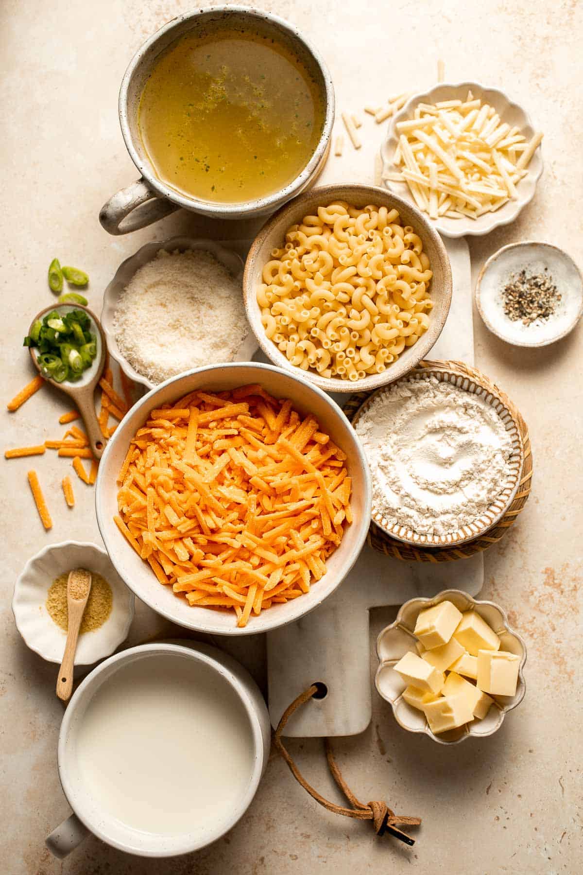 This decadent Mac and Cheese Soup is everything you love about macaroni and cheese turned into a rich and creamy soup. Ready in just 30 minutes! | aheadofthyme.com