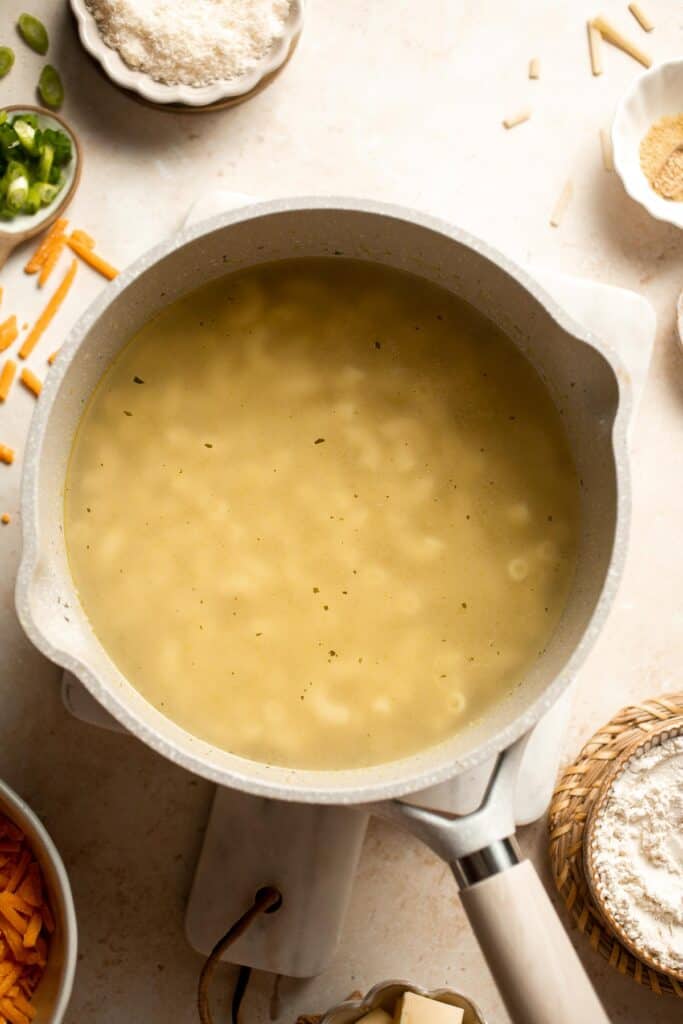 This decadent Mac and Cheese Soup is everything you love about macaroni and cheese turned into a rich and creamy soup. Ready in just 30 minutes! | aheadofthyme.com