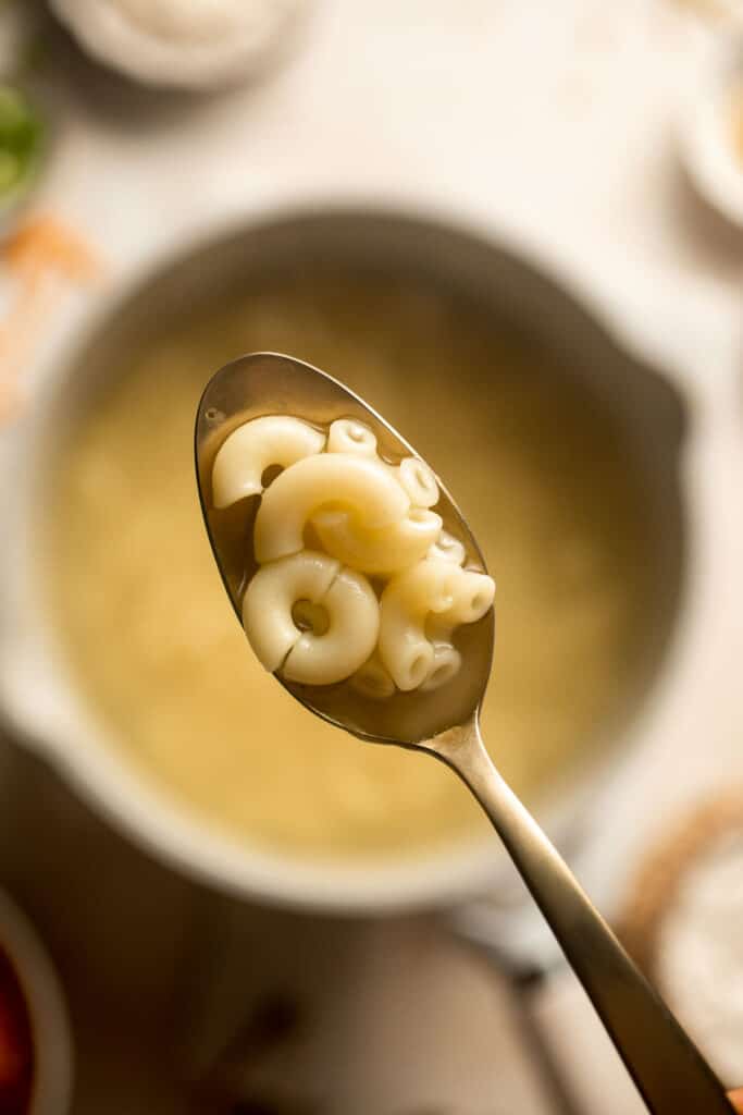 This decadent Mac and Cheese Soup is everything you love about macaroni and cheese turned into a rich and creamy soup. Ready in just 30 minutes! | aheadofthyme.com