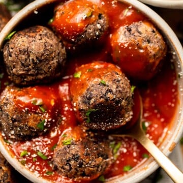 Easy Vegetarian Meatballs are made with cheesy black beans and a mixture of aromatic spices — perfect for adding protein, texture, and flavor to your meal. | aheadofthyme.com