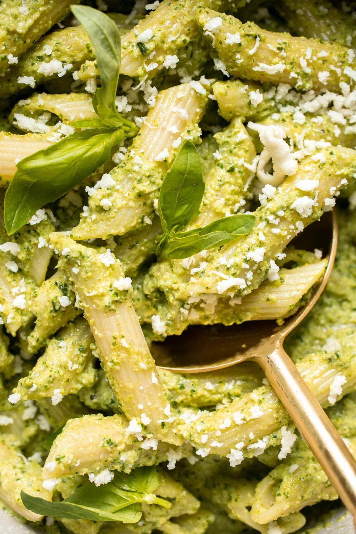 Broccoli Pesto Pasta is a fun twist on traditional pesto sauce and is ready to serve in under 30 minutes. It's a great way to serve some extra veggies! | aheadofthyme.com