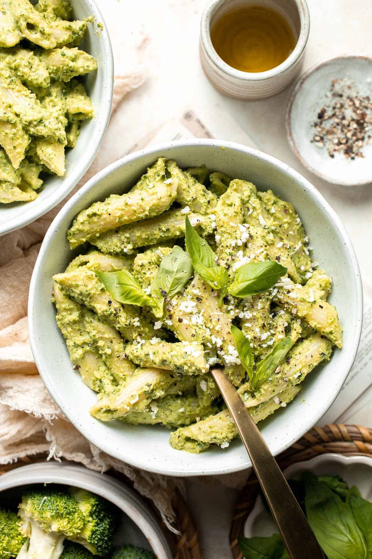 Broccoli Pesto Pasta is a fun twist on traditional pesto sauce and is ready to serve in under 30 minutes. It's a great way to serve some extra veggies! | aheadofthyme.com