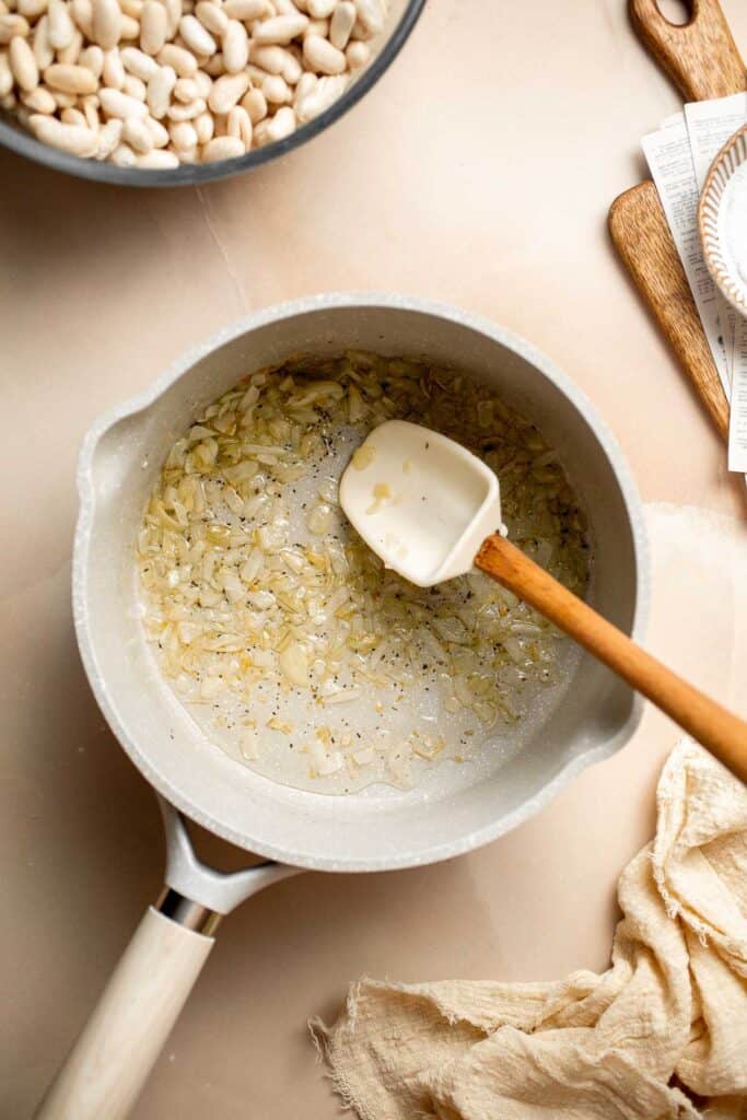 One pot Cannellini Beans are creamy, buttery, and nourishing. Serve them as a simple vegan side dish or as a delicious addition to soups, salads, and more. | aheadofthyme.com