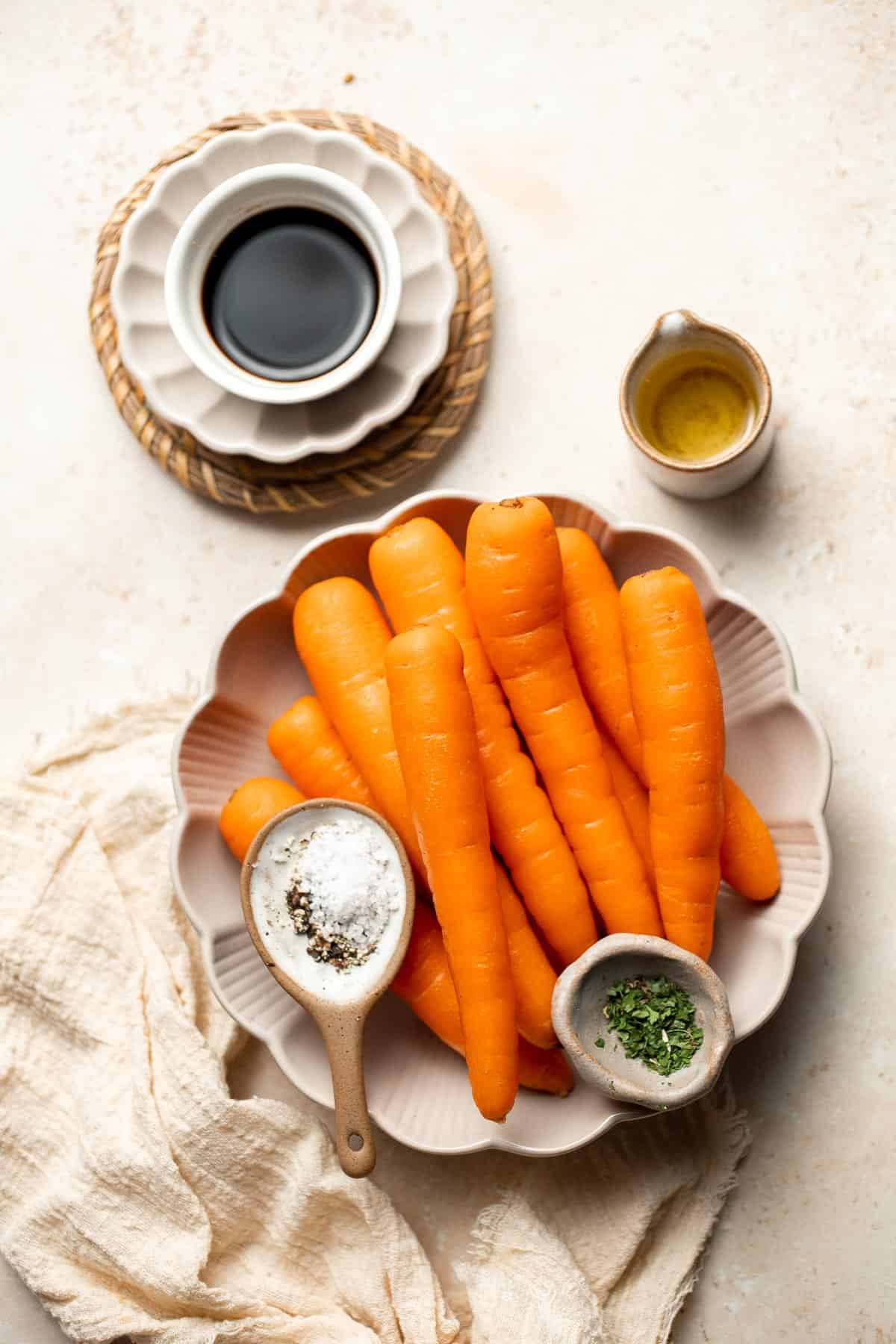 Balsamic Roasted Carrots are an easy side dish to make with a handful of simple ingredients that creates a complex blend of flavors in every bite. | aheadofthyme.com