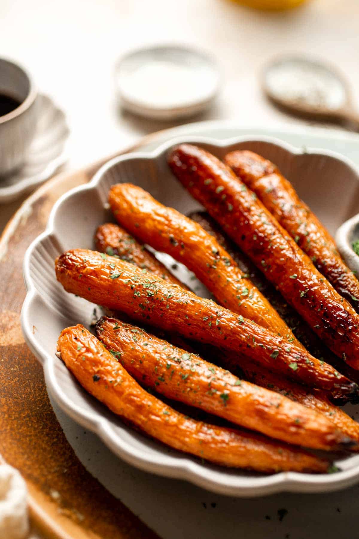 Balsamic Roasted Carrots are an easy side dish to make with a handful of simple ingredients that creates a complex blend of flavors in every bite. | aheadofthyme.com