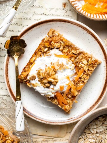 Start your day off right with the coziest Carrot Cake Baked Oatmeal, with all the flavors of the classic dessert — but for breakfast! | aheadofthyme.com