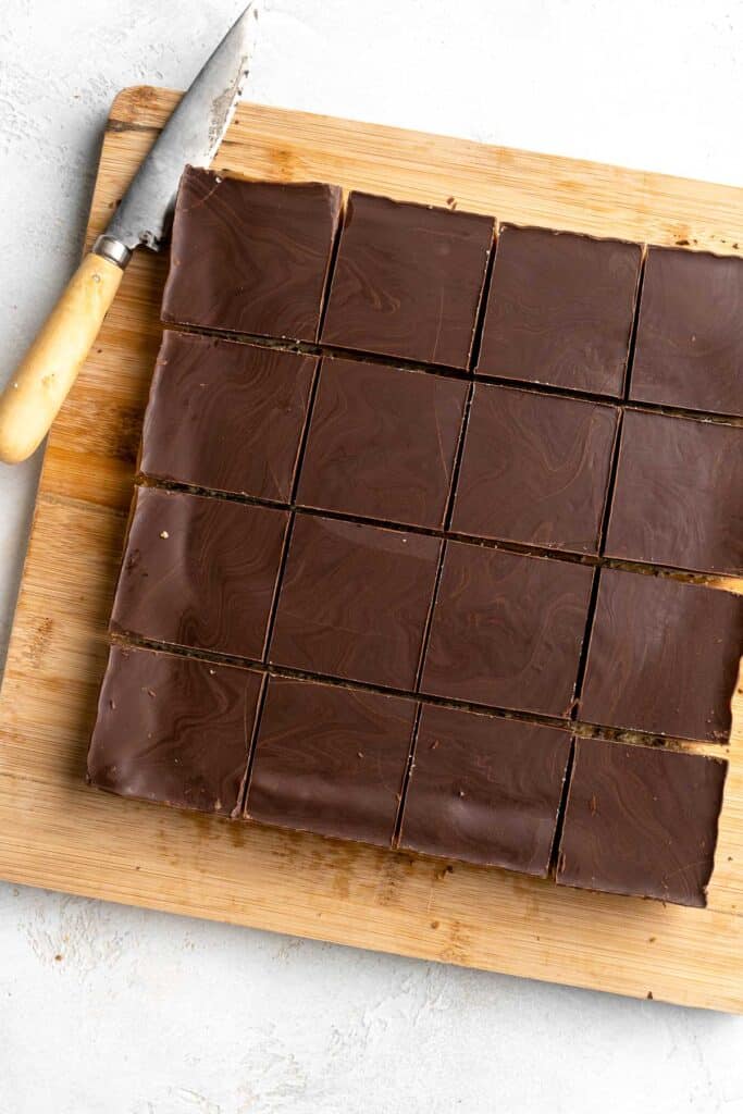 Millionaire's Shortbread are a triple-layered treat of buttery shortbread, homemade caramel, and chocolate for the perfect balance of textures and flavors. | aheadofthyme.com