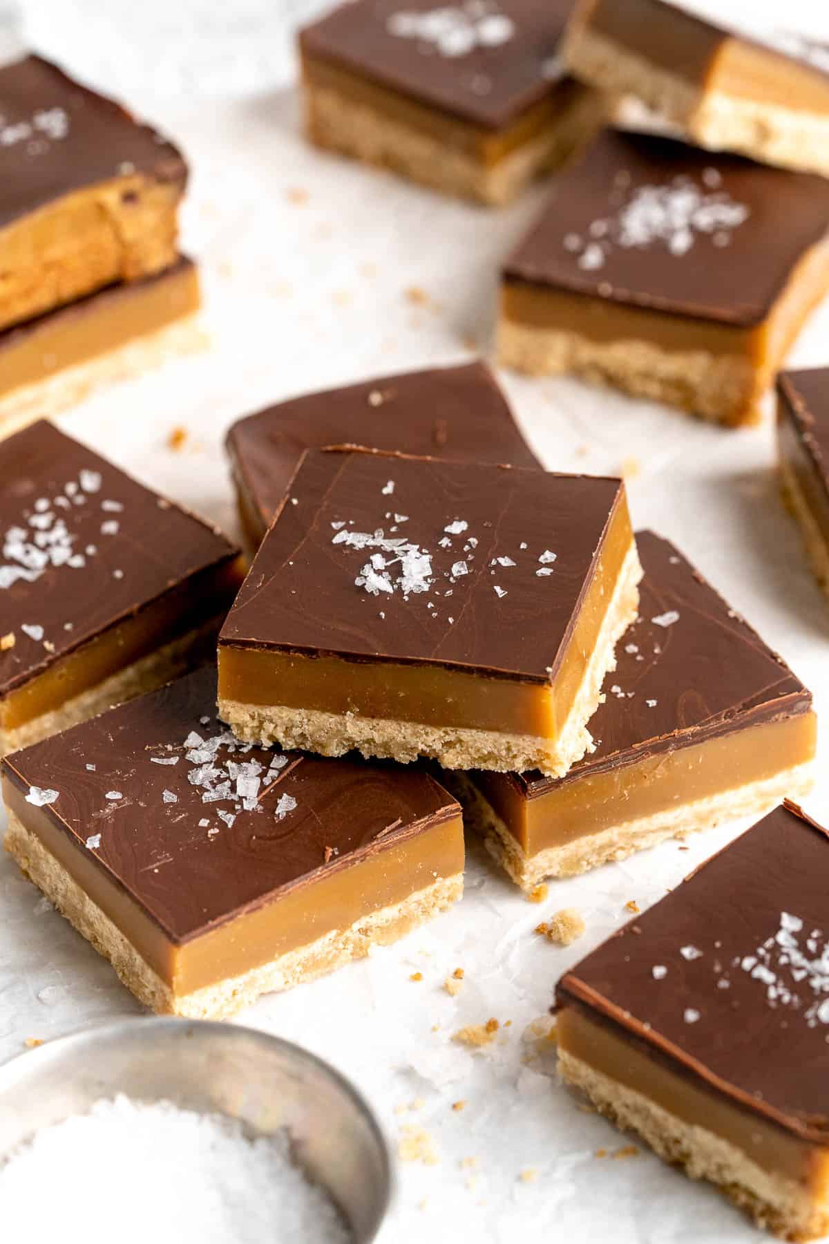Millionaire's Shortbread are a triple-layered treat of buttery shortbread, homemade caramel, and chocolate for the perfect balance of textures and flavors. | aheadofthyme.com