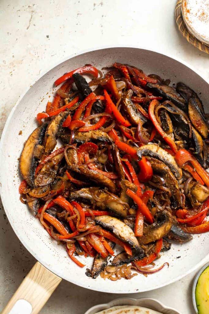 Mushroom Fajitas have all the sizzle and flair of traditional fajitas without the meat! Made with portobello mushrooms, peppers, and onions in 30 minutes! | aheadofthyme.com