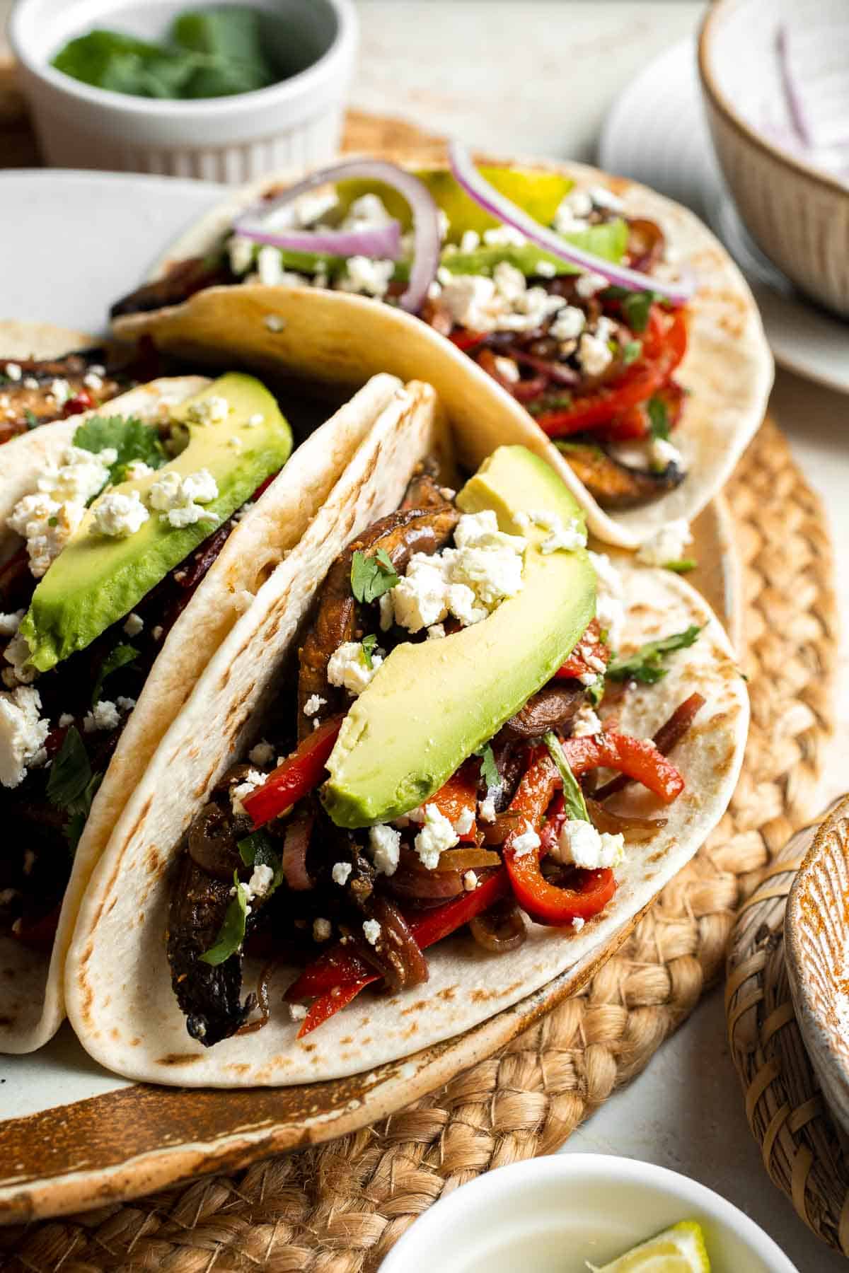 Mushroom Fajitas have all the sizzle and flair of traditional fajitas without the meat! Made with portobello mushrooms, peppers, and onions in 30 minutes! | aheadofthyme.com