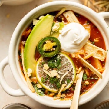 Vegetarian Tortilla Soup is loaded with the savory spices and bold flavors of classic tortilla soup but without any meat. Ready in 30 minutes! | aheadofthyme.com