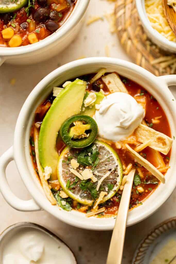Vegetarian Tortilla Soup is loaded with the savory spices and bold flavors of classic tortilla soup but without any meat. Ready in 30 minutes! | aheadofthyme.com
