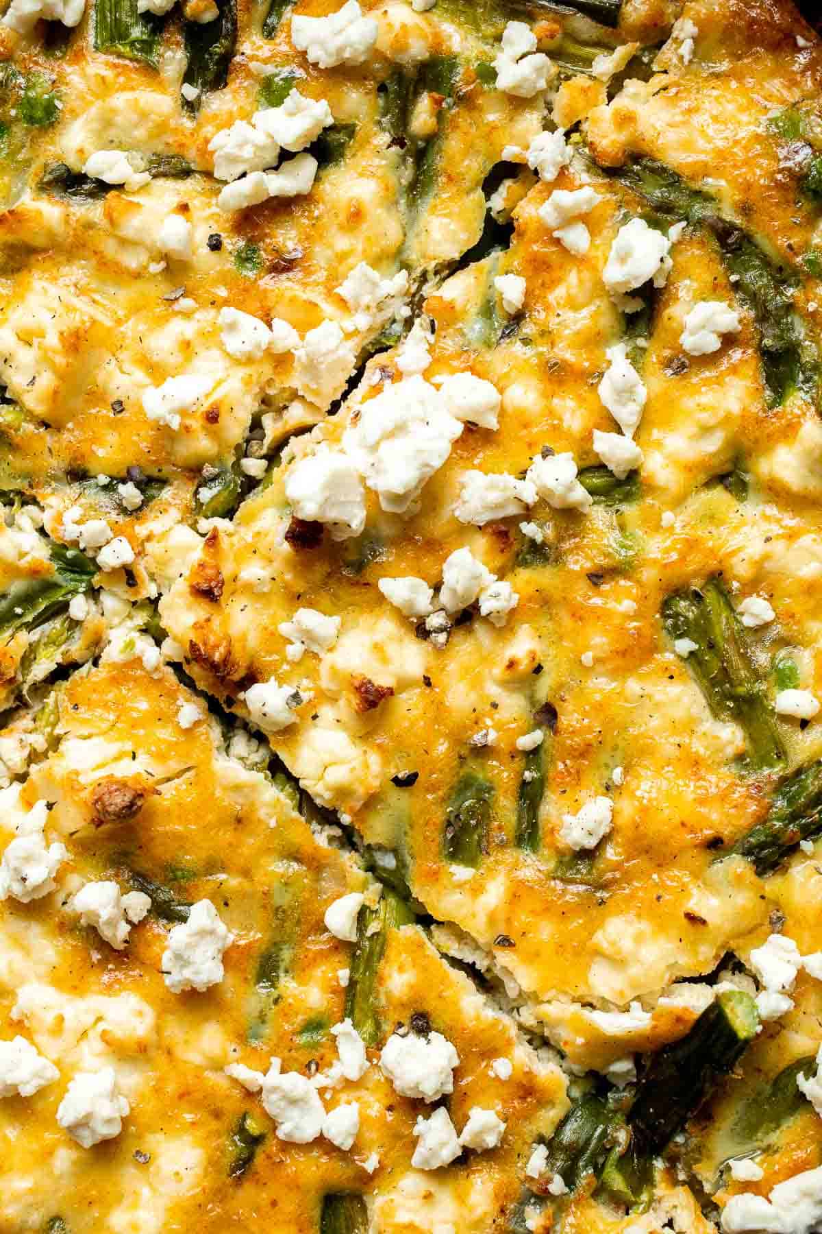 This Asparagus Frittata, made with sautéed asparagus and peas baked with eggs and creamy feta cheese, is perfect for your next spring brunch! | aheadofthyme.com