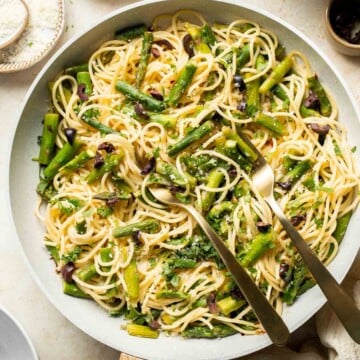 Make the most of the spring harvest with this delightfully simple lemony Asparagus Pasta recipe. Ready in under 20 minutes! | aheadofthyme.com