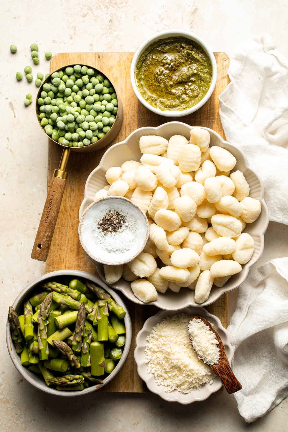 Spring Vegetable Gnocchi with tender asparagus, peas, and pesto is the perfect way to enjoy the flavors of the season. Ready in 20 minutes! | aheadofthyme.com