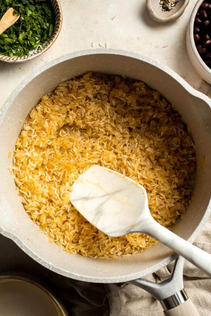 Black Beans and Rice is truly the perfect side dish: easy to make, inexpensive, and filling! Serve this simple recipe as a vegan main course or side. | aheadofthyme.com