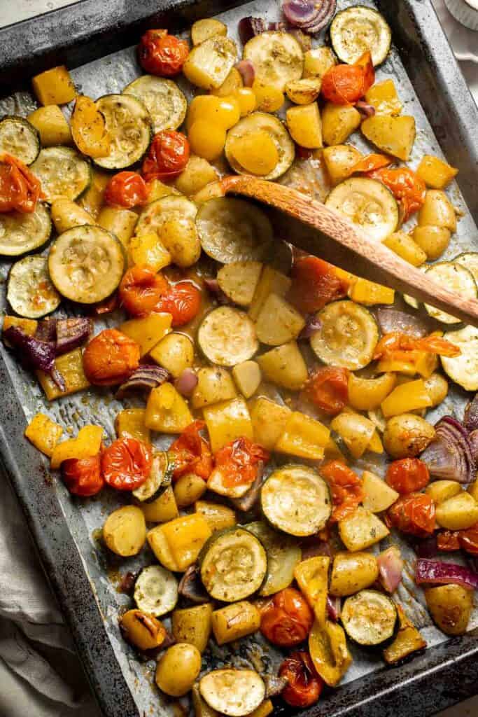 Mediterranean Roasted Vegetables are the easiest and most flavorful side dish to serve with dinner — especially with Greek and Italian meals. | aheadofthyme.com