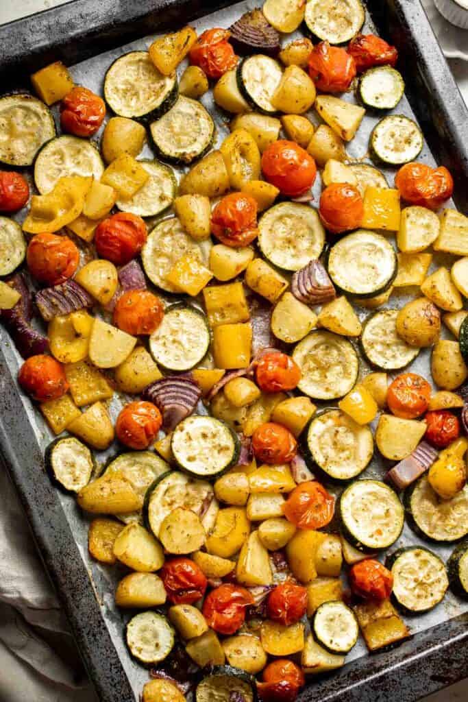 Mediterranean Roasted Vegetables are the easiest and most flavorful side dish to serve with dinner — especially with Greek and Italian meals. | aheadofthyme.com