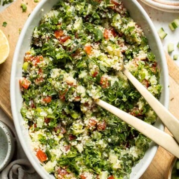 This easy Tabbouleh Salad is made in the traditional style with bulgur wheat, lots of fresh herbs, and summer veggies marinated in a simple dressing. | aheadofthyme.com