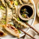 Made with a savory vegan mixture of mushrooms, cabbage, carrots, and more, these homemade Vegetable Dumplings are meaty and satisfying — without any meat! | aheadofthyme.com