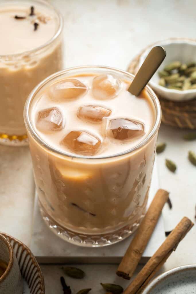 Sweet, spicy, and ice cold, is there anything more refreshing than an Iced Chai Latte? It's easy to make at home with just a teabag and a little patience. | aheadofthyme.com
