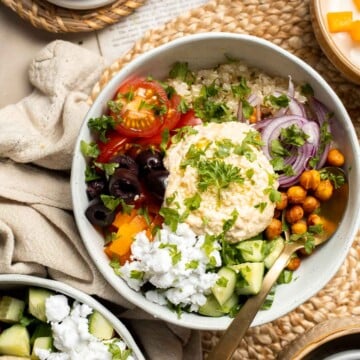 This Mediterranean Bowl is healthy, nourishing, and delicious. It's made with quinoa, hummus, chickpeas, and fresh veggies to keep you full for hours. | aheadofthyme.com