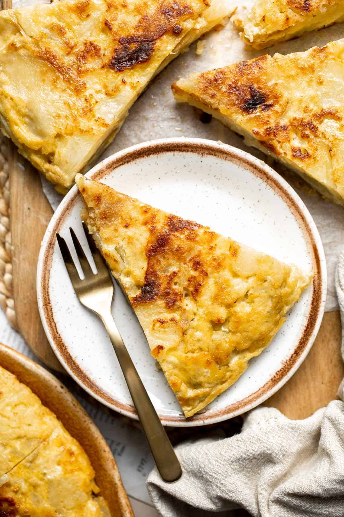 This traditional Spanish Tortilla, also known as tortilla española or tortilla de patatas, is a popular egg and potato dish served across Spain. | aheadofthyme.com