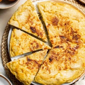 This traditional Spanish Tortilla, also known as tortilla española or tortilla de patatas, is a popular egg and potato dish served across Spain. | aheadofthyme.com