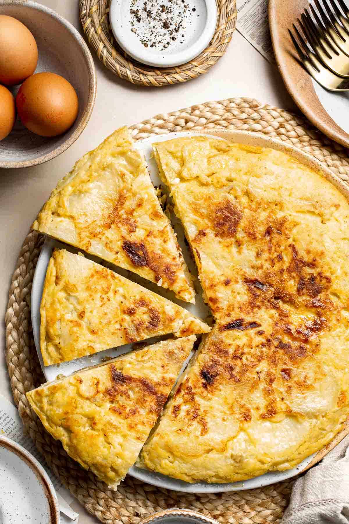 This traditional Spanish Tortilla, also known as tortilla española or tortilla de patatas, is a popular egg and potato dish served across Spain. | aheadofthyme.com