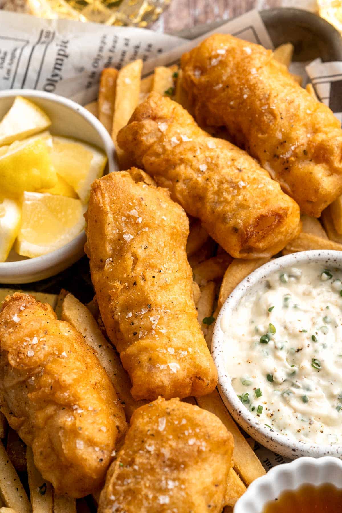 Crispy Beer Battered Fish is flaky and tender on the inside with a crispy, crunchy coating on the outside — the best traditional fish and chips! | aheadofthyme.com
