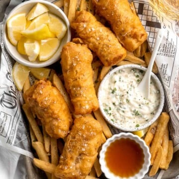 Crispy Beer Battered Fish is flaky and tender on the inside with a crispy, crunchy coating on the outside — the best traditional fish and chips! | aheadofthyme.com