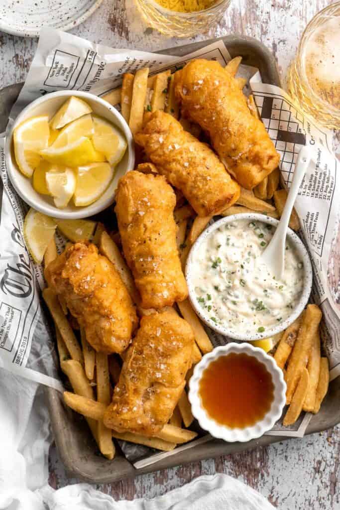 Crispy Beer Battered Fish is flaky and tender on the inside with a crispy, crunchy coating on the outside — the best traditional fish and chips! | aheadofthyme.com