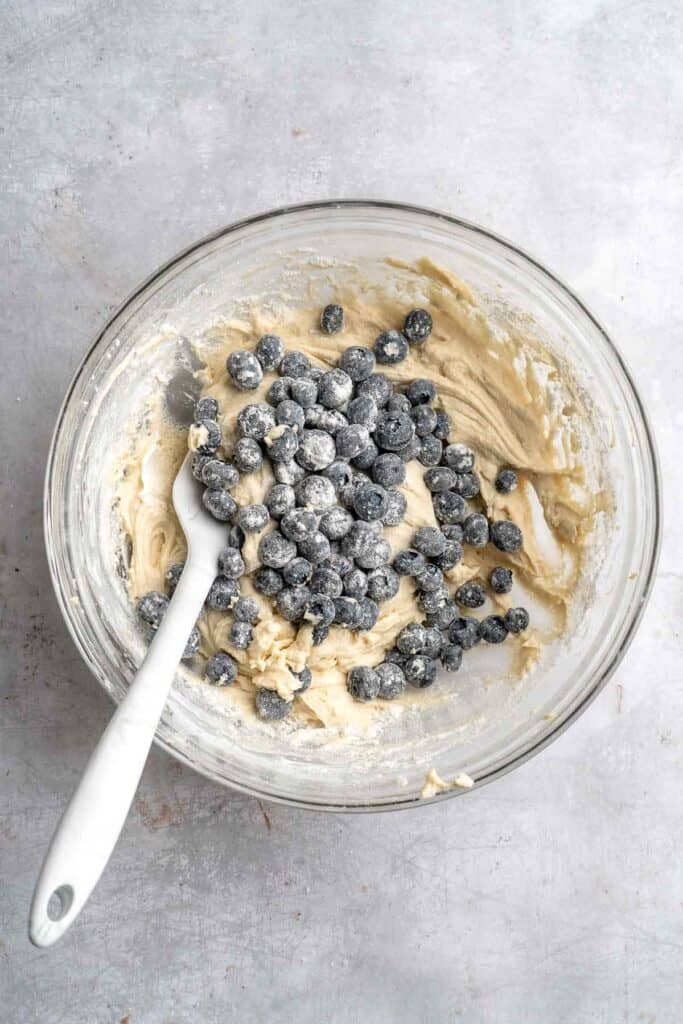 Blueberry Cupcakes are a homemade treat with moist and tender vanilla cupcake batter loaded with fresh blueberries and topped with blueberry buttercream. | aheadofthyme.com