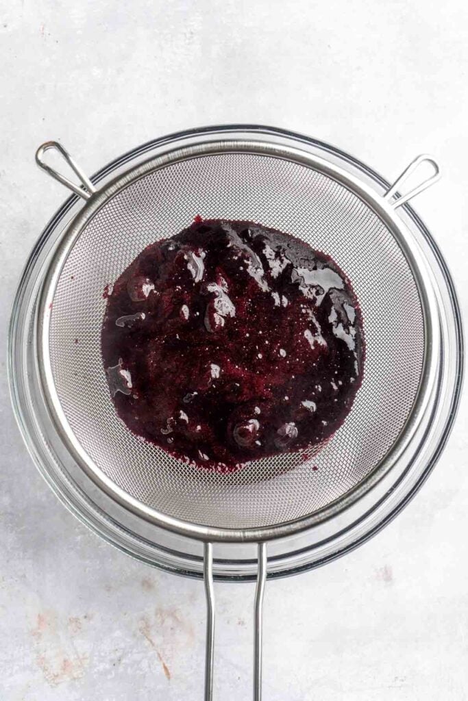 Blueberry Cupcakes are a homemade treat with moist and tender vanilla cupcake batter loaded with fresh blueberries and topped with blueberry buttercream. | aheadofthyme.com