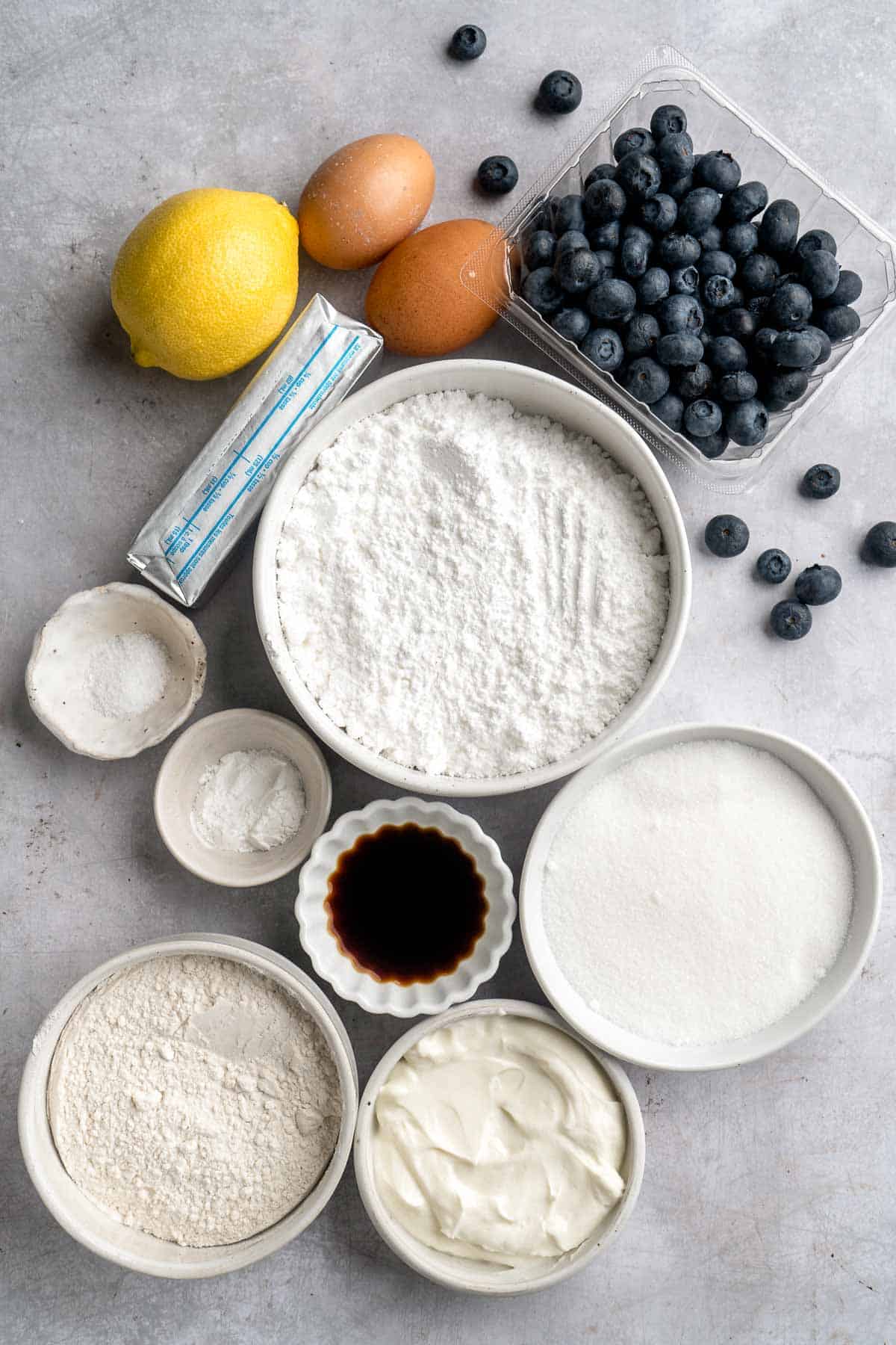 Blueberry Cupcakes are a homemade treat with moist and tender vanilla cupcake batter loaded with fresh blueberries and topped with blueberry buttercream. | aheadofthyme.com