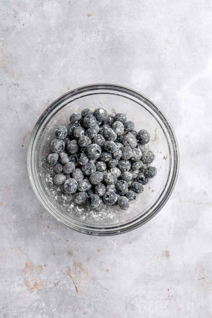 Blueberry Cupcakes are a homemade treat with moist and tender vanilla cupcake batter loaded with fresh blueberries and topped with blueberry buttercream. | aheadofthyme.com
