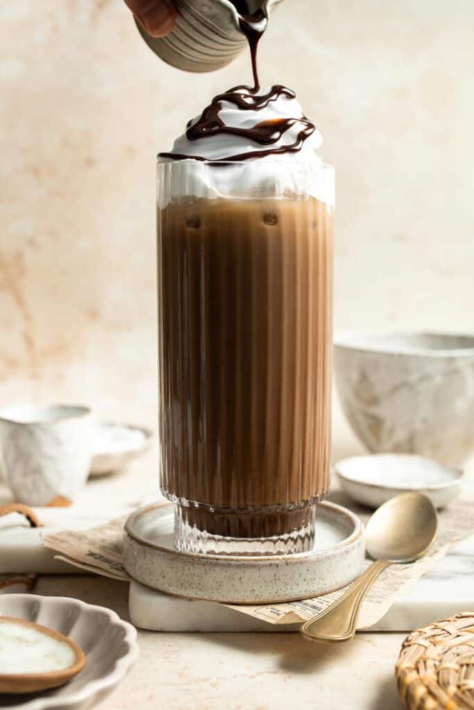 Homemade Iced Mocha latte is sweet, creamy, and chocolaty, just like your favorite coffee shop drink — but it's way cheaper and ready to be served any time! | aheadofthyme.com