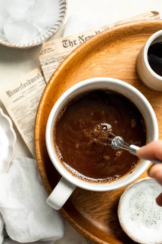 Homemade Iced Mocha latte is sweet, creamy, and chocolaty, just like your favorite coffee shop drink — but it's way cheaper and ready to be served any time! | aheadofthyme.com