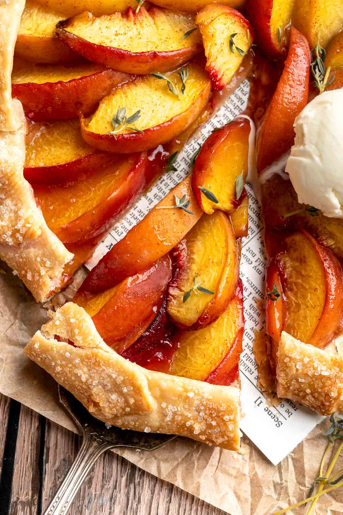 This homemade Peach Galette is a simple, rustic tart, perfect for enjoying the flavors of summer! It's buttery and flaky with tender, spiced peaches. | aheadofthyme.com