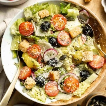 Simple Italian Salad is fresh, delicious, and flavorful. This Olive Garden copycat is loaded with fresh veggies and lightly tossed in homemade dressing. | aheadofthyme.com