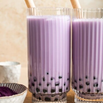 Homemade Taro Bubble Tea is cold and creamy with a nutty vanilla flavor with pops of chewy boba pearls. It's a lot easier to make at home than you think! | aheadofthyme.com